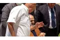 على كرسي متحرك. ممدوح عباس في جنازة هاني شاكر