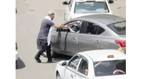فوضى السايس في الجيزة: كيف تستعيد حقك في شوارع المحافظة؟