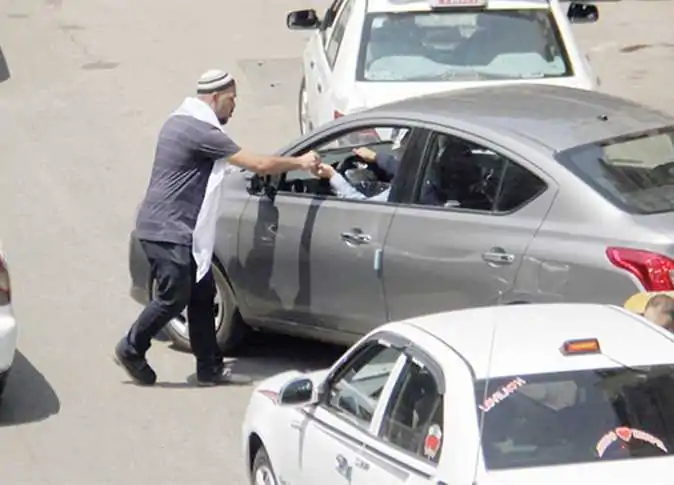 فوضى السايس في الجيزة: كيف تستعيد حقك في شوارع المحافظة؟